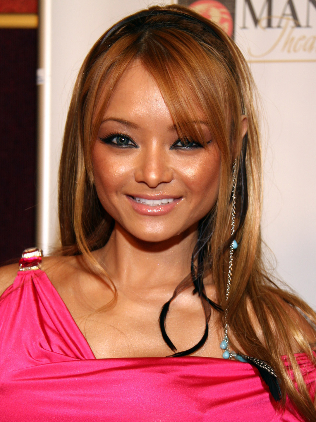 How tall is Tila Tequila?